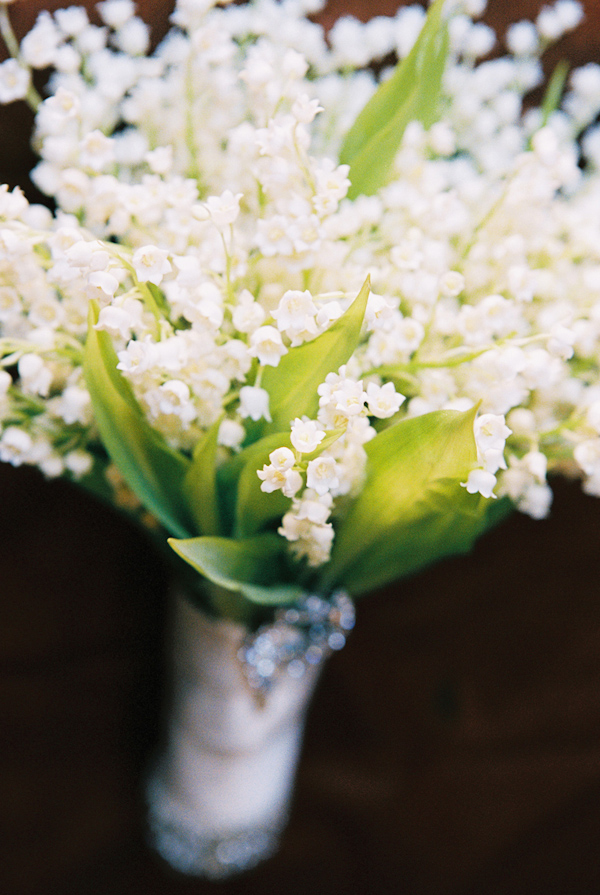 white lily of the valley wedding bouquet photo by Yvette Roman Photography